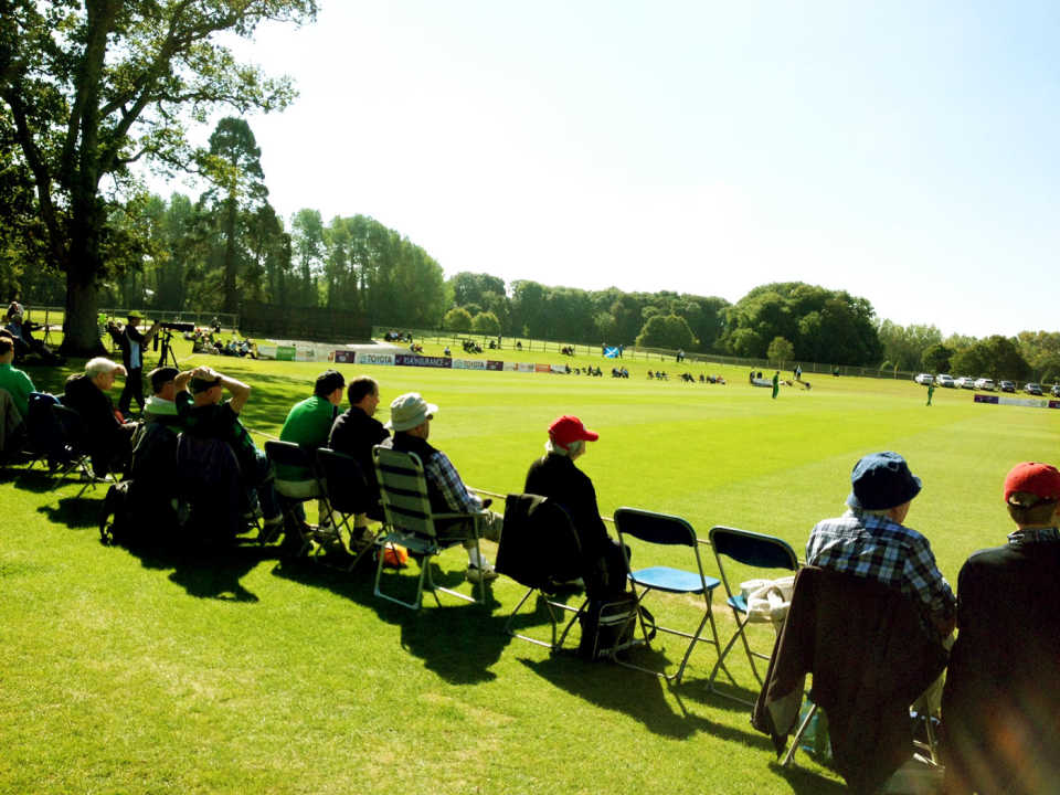 Spectators watch the match from the boundary side in Malahide