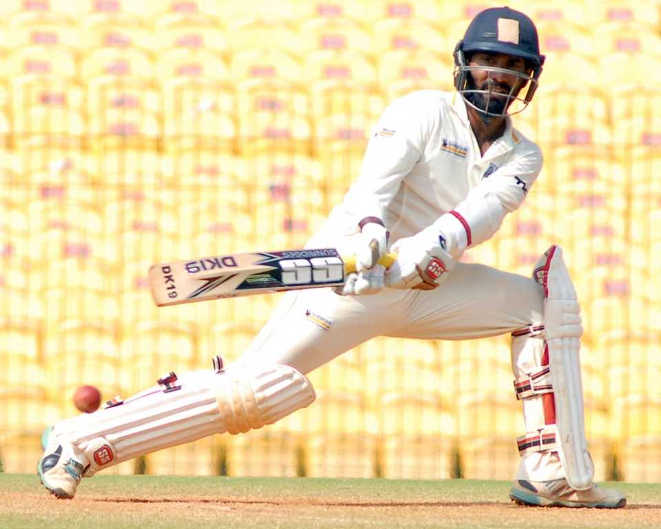 Dinesh Karthik struck a rapid century while following-on