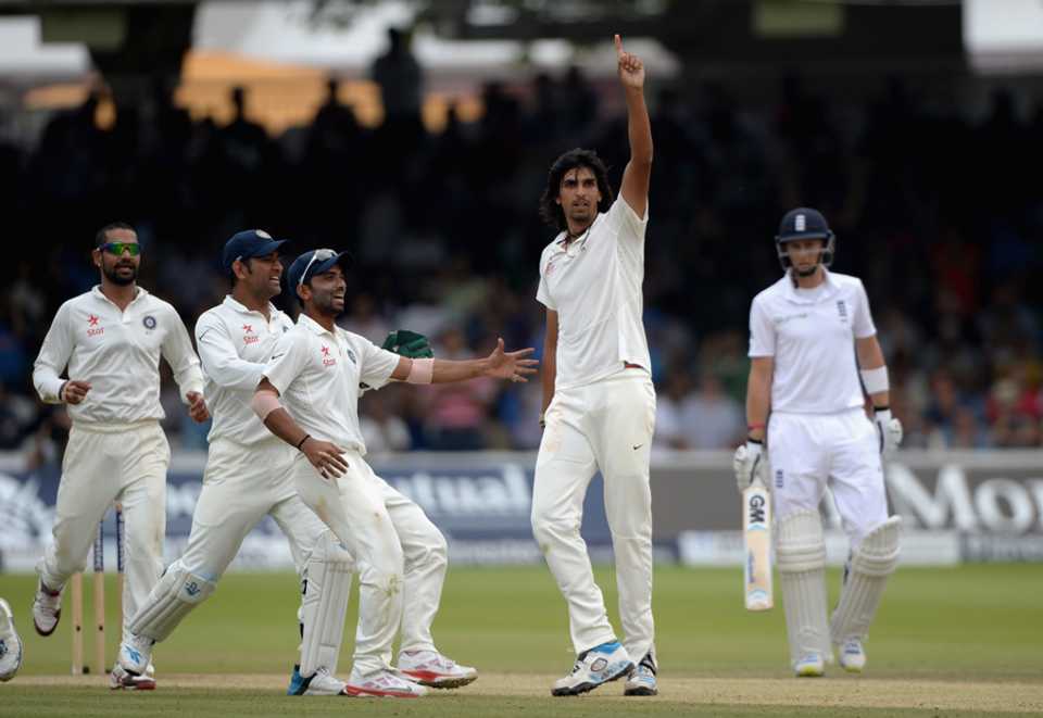 India run towards Ishant Sharma after he completes a five-for