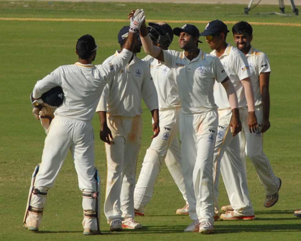 Tamil Nadu players celebrate their innings win over Mumbai