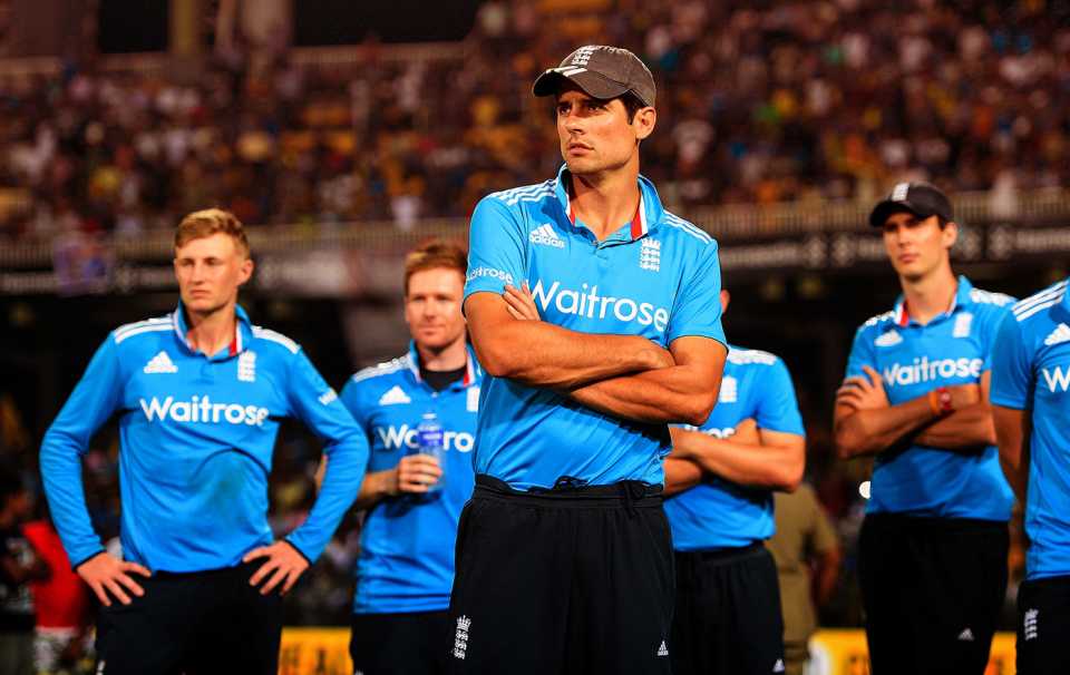 Alastair Cook and his team-mates look dejected after the series loss, Sri Lanka v England, 7th ODI, Colombo, December 16, 2014