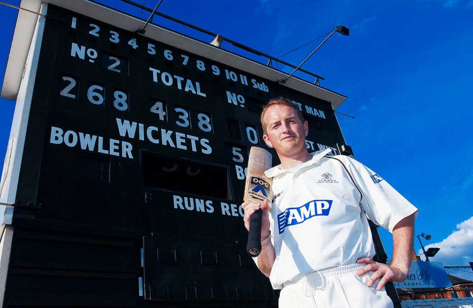 Ali Brown poses next to the scoreboard after his record 268, Surrey v Glamorgan, C&G Trophy, The Oval, June 19, 2002