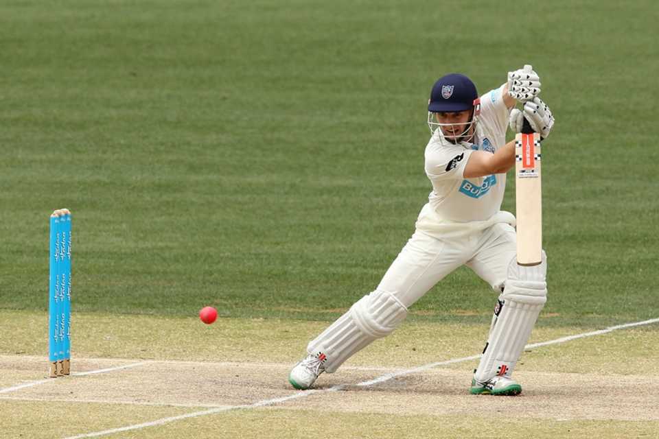 Peter Nevill drives through the off side