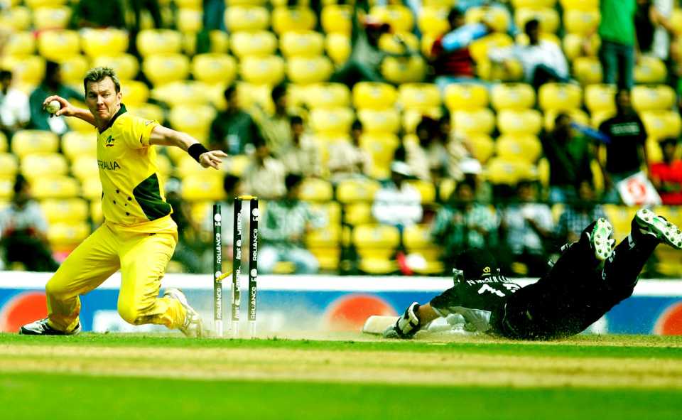Nathan McCullum dives into the crease as Brett Lee looks to run out Jamie How at the other end, Australia v New Zealand, World Cup, Group A, Nagpur, February 25, 2011