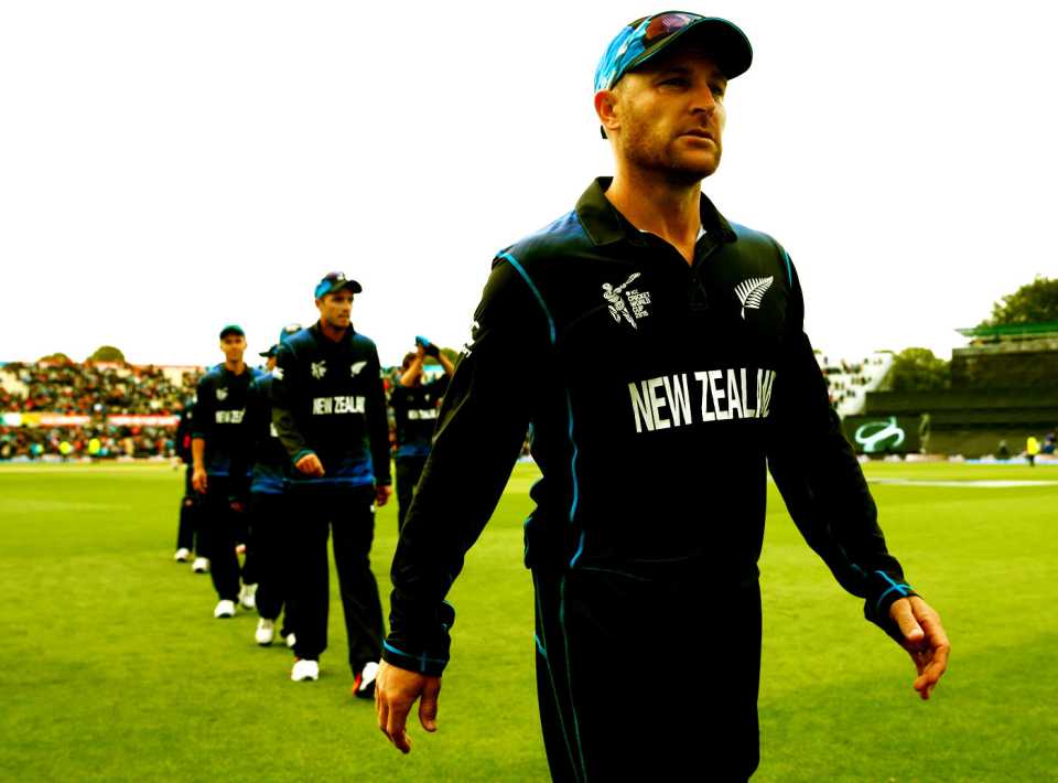 Brendon McCullum leads his players off the field