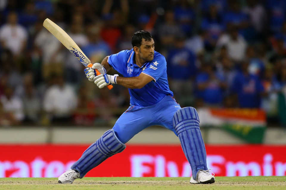 MS Dhoni winds up for a big hit