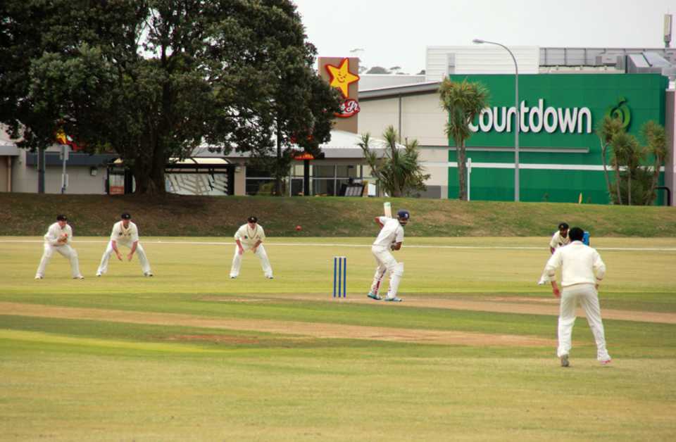Jeet Raval lets one through on his way to a hundred