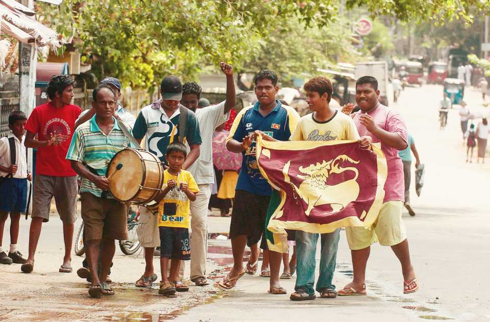 Sri Lankan fans celebrate their team's semi-final win