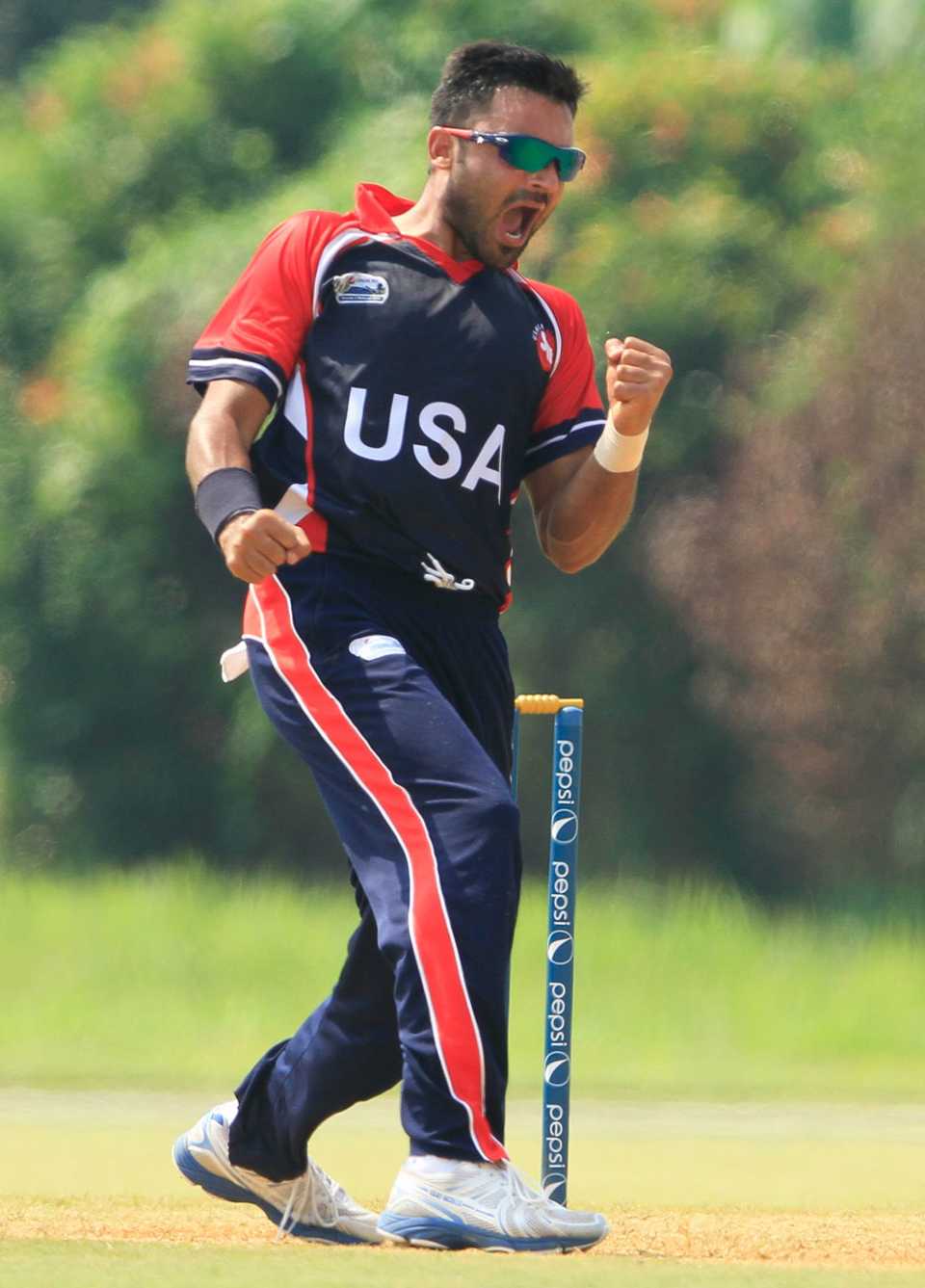 Danial Ahmed celebrates a wicket, ICC World Cricket League Division Three, Kuala Lumpur