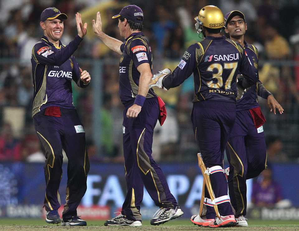 Johan Botha is congratulated for taking a catch