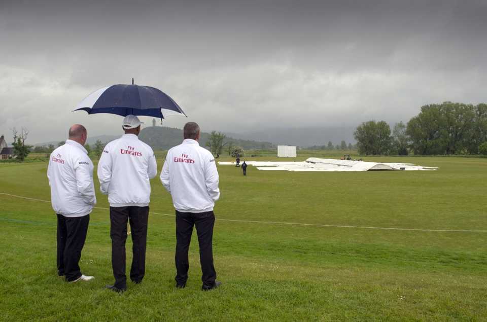The umpires wait for wet weather to clear in Stirling