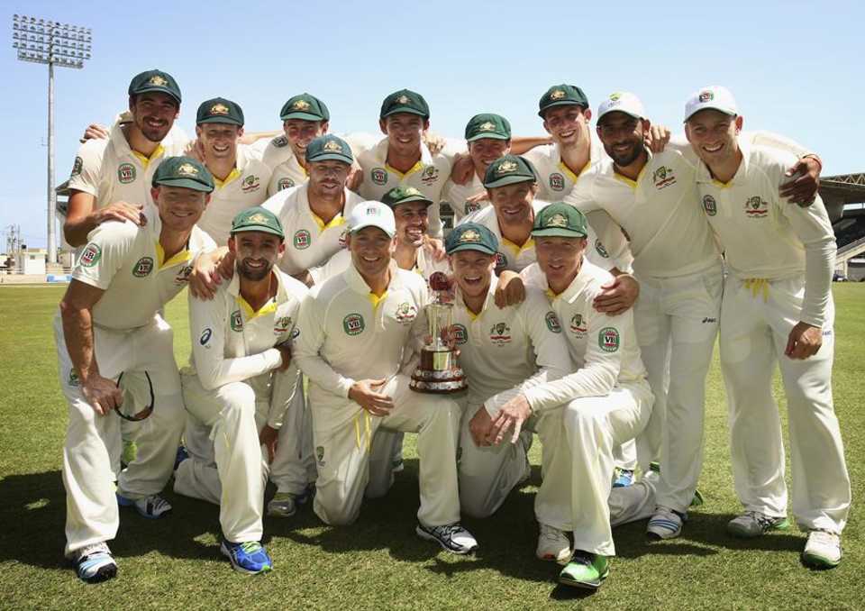 The Australians pose with the Frank Worrell Trophy