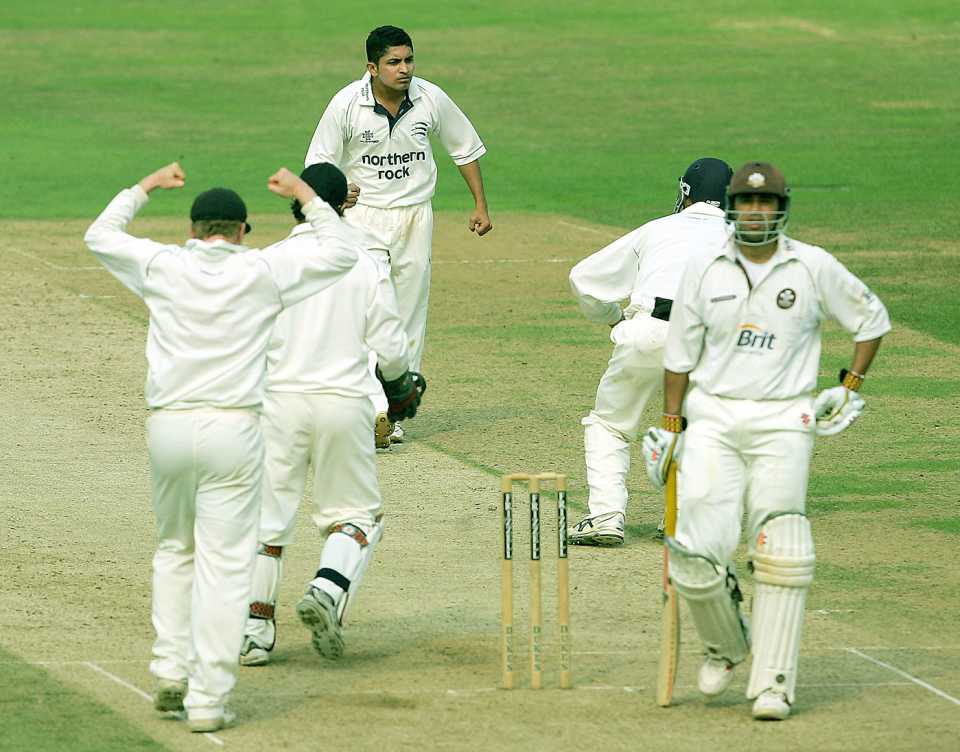 Yogesh Golwalkar celebrates after taking a wicket
