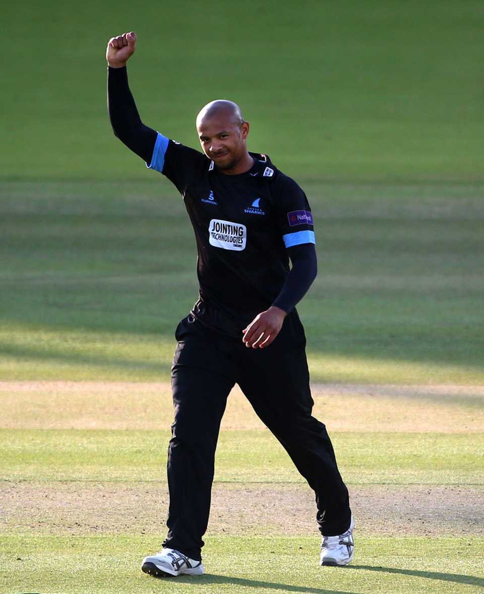 Sussex bowler Tymal Mills celebrates one of his four wickets against Middlesex