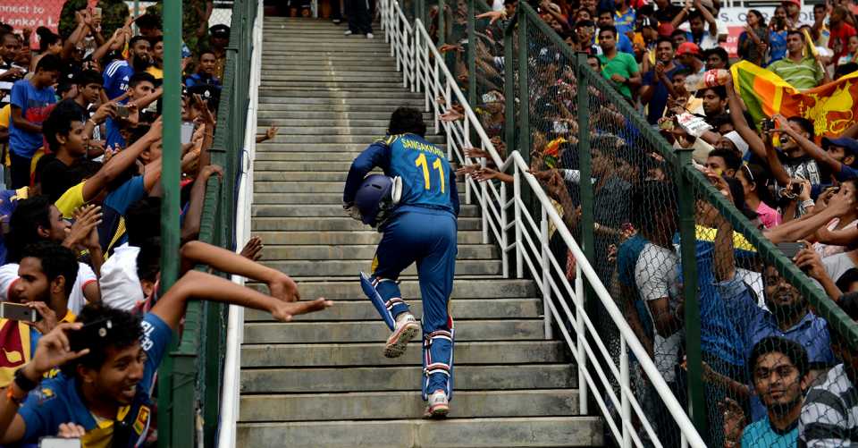 Kumar Sangakkara heads for the dressing room, Sri Lanka v England, 6th ODI, Pallekele, December 13, 2014