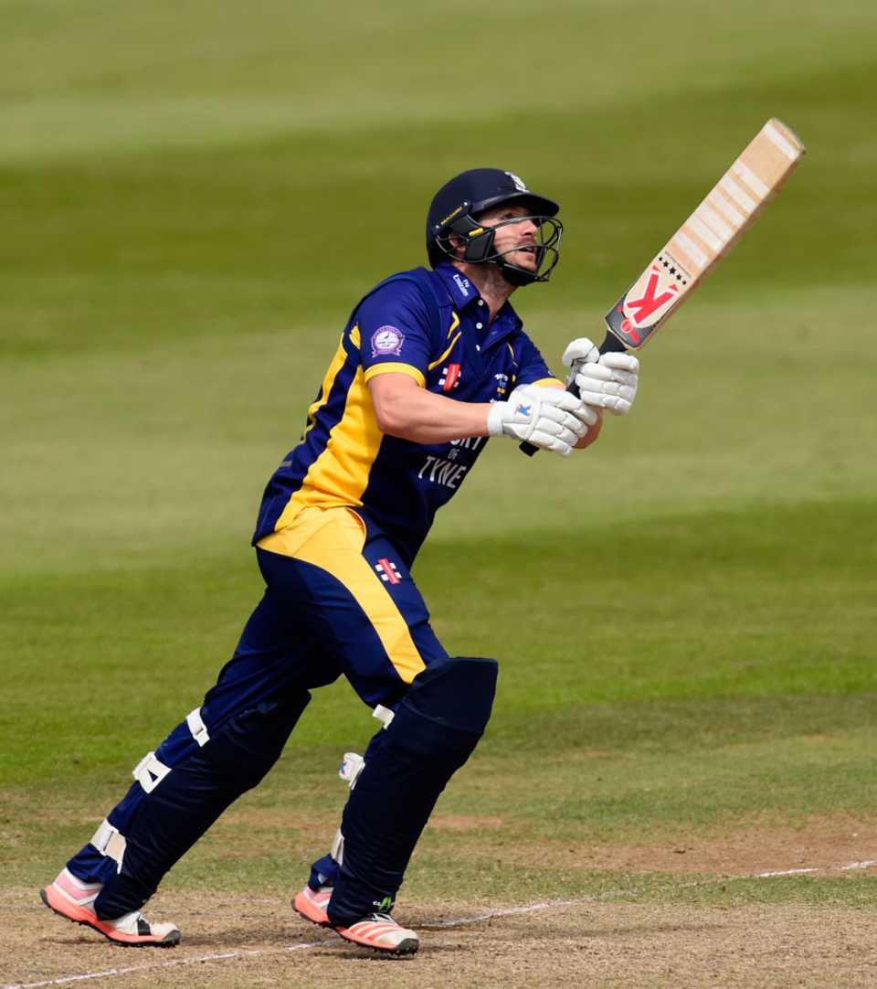 Mark Stoneman hits over the top on the way to his hundred