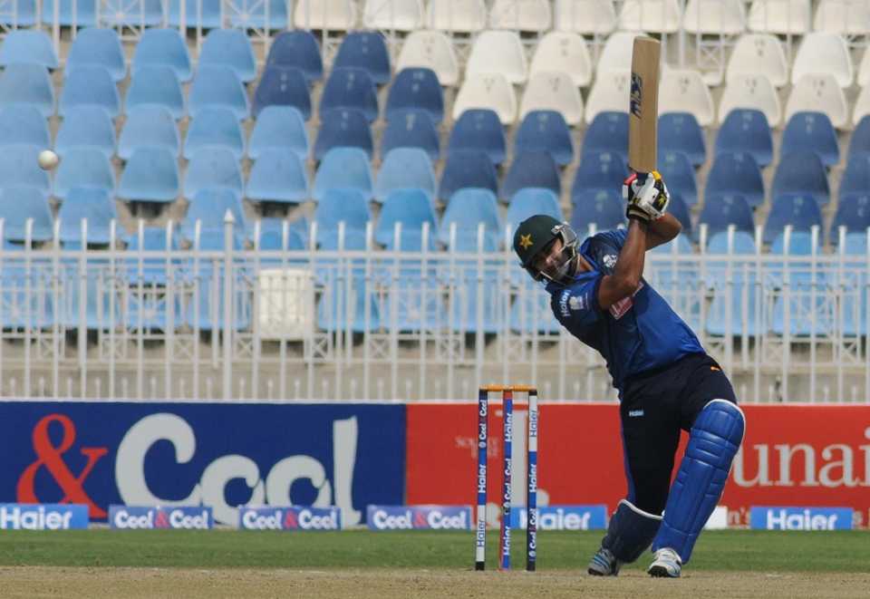 Shahzaib Hasan drills the ball through the off side