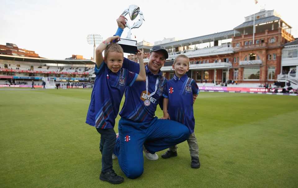 Geraint Jones rejoices with his kids after the title win