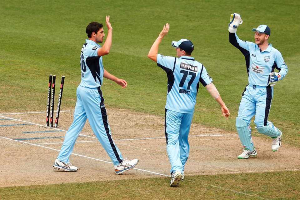 Mitchell Starc celebrates one of his four wickets