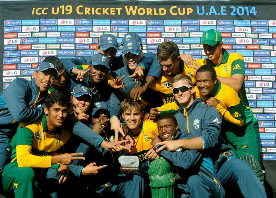 The South Africa players lift the World Cup trophy