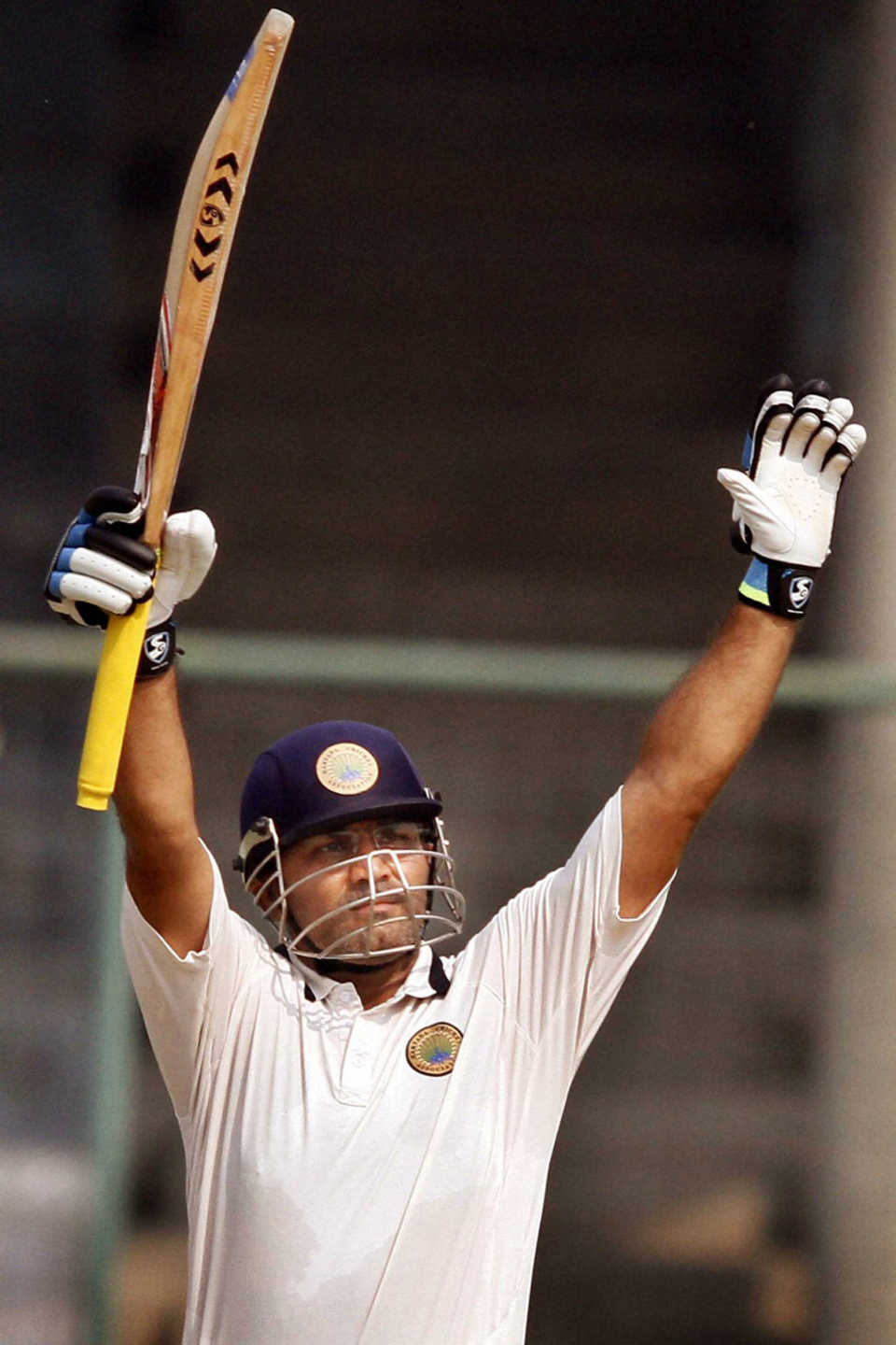 Virender Sehwag celebrates his fifty against his former team, Delhi