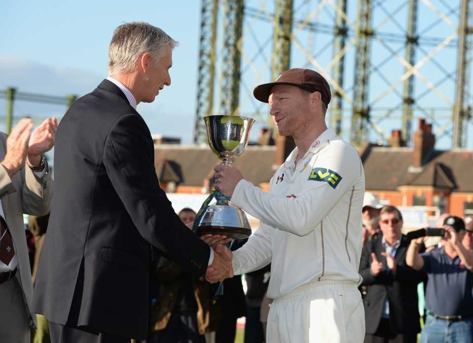 Gareth Batty receives the Division Two trophy