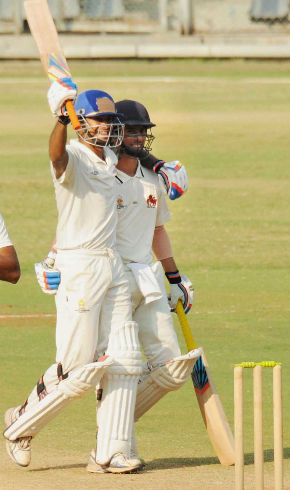 Captain Aditya Tare celebrates Mumbai's win with Siddhesh Lad