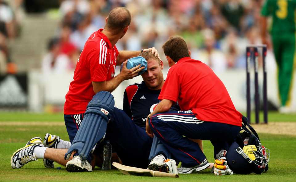 Andrew Flintoff receives an ice pack treatment after being hit on the helmet, England v South Africa, 3rd ODI, The Oval, August 29, 2008