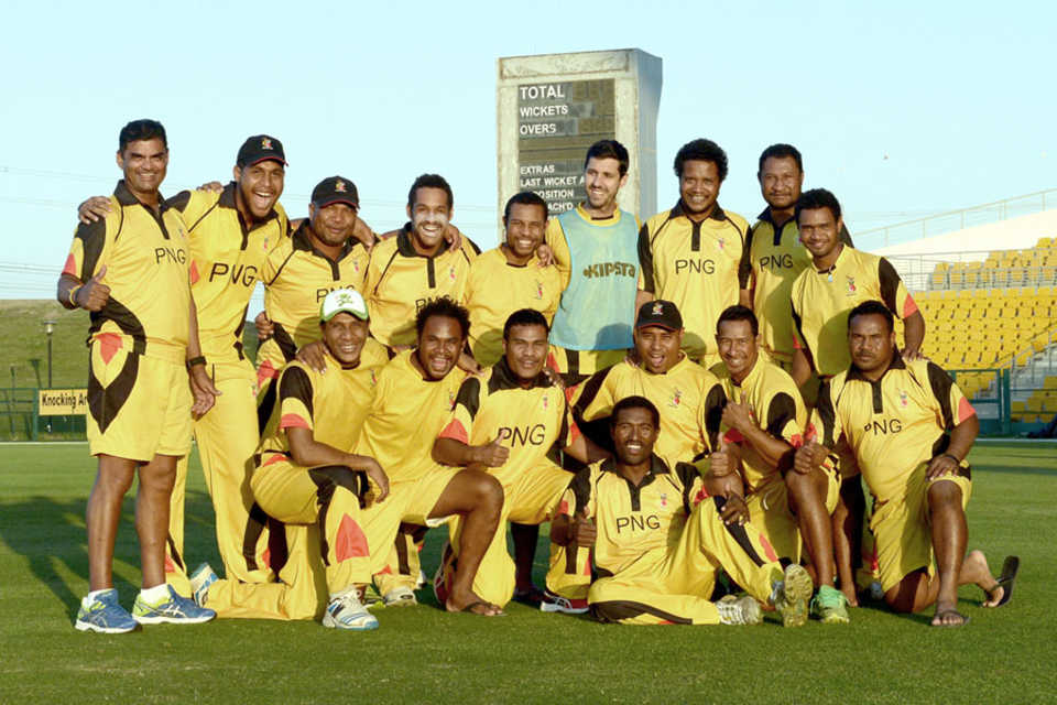 The Papua New Guinea players line up for a team photograph after beating Nepal