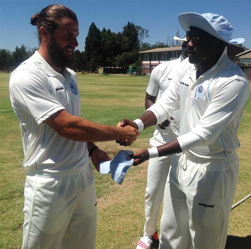 Kyle Bowie is presented his cap on first-class debut for Matabeleland Tuskers
