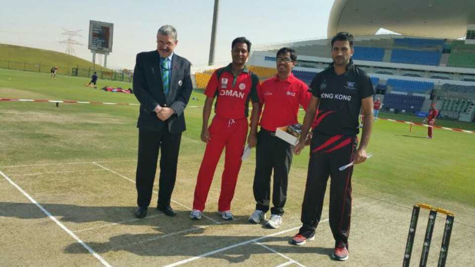3rd T20I Hong Kong v Oman, DT Jukes the match referee, Rabiul Hoque the reserve umpire and the captains at the toss.