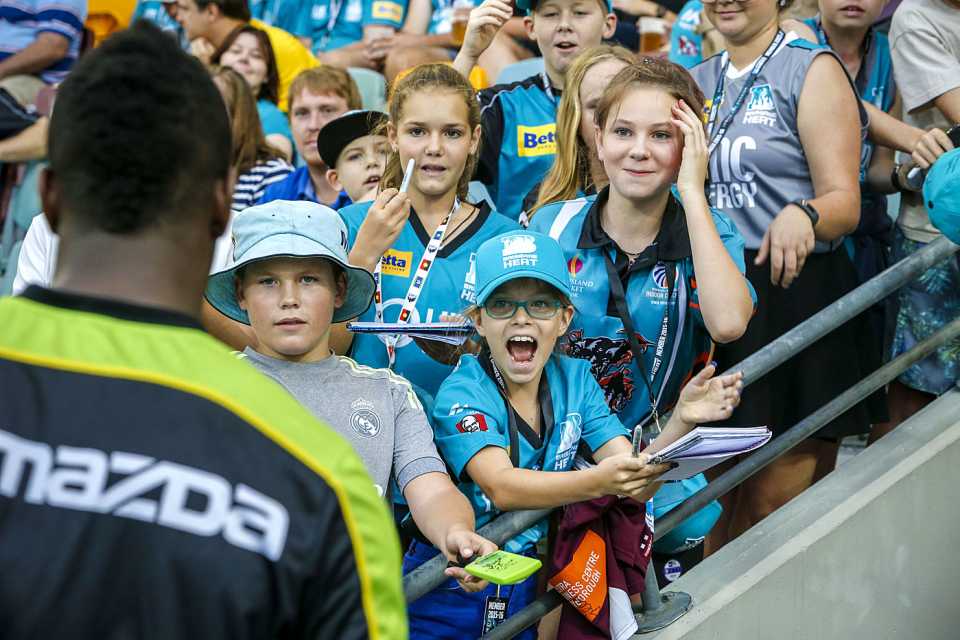 Young Brisbane Heat fans can't wait to get Andre Russell's autograph