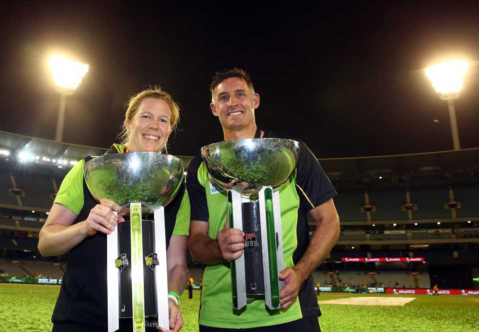 A Thunder double: Alex Blackwell and Michael Hussey pose with the WBBL and BBL trophies, Melbourne, January, 24, 2016