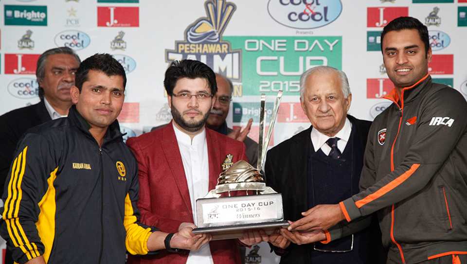 Kamran Akmal and Zohaib Ahmed pose with the National One Day Cup trophy after rain washed out the final in Islamabad, National Bank of Pakistan v Islamabad, National One Day Cup, final, Islamabad, January 29, 2016