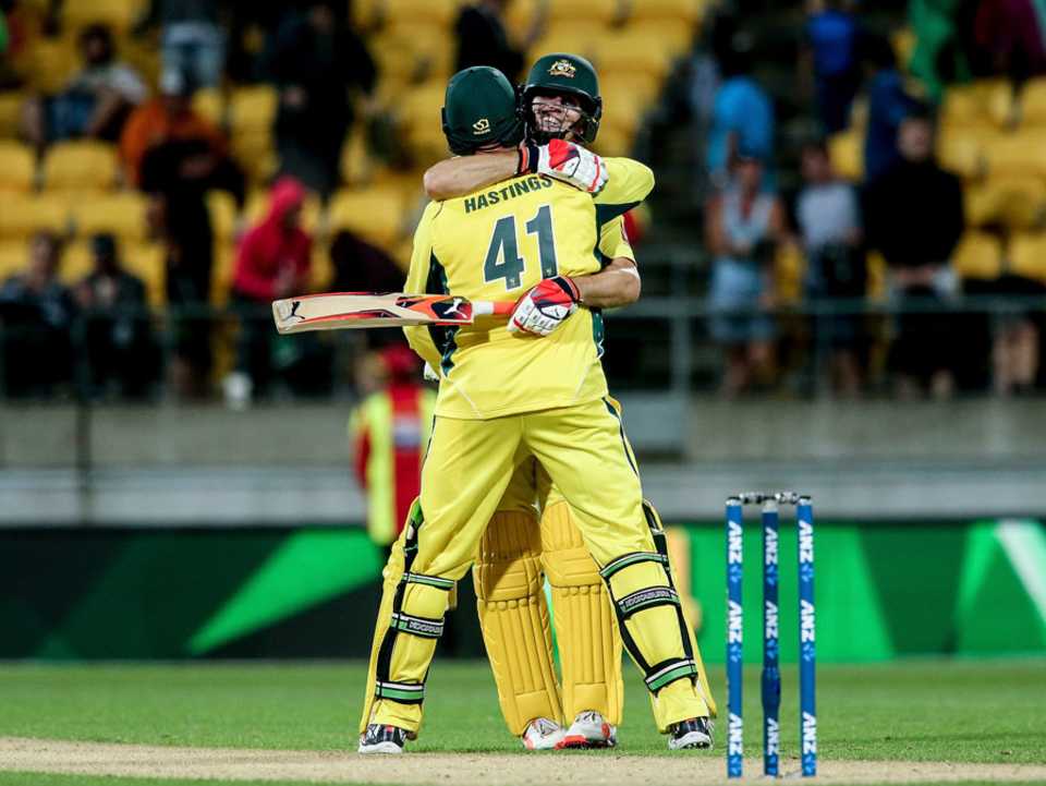 Mitchell Marsh and John Hastings embrace after Australia's win