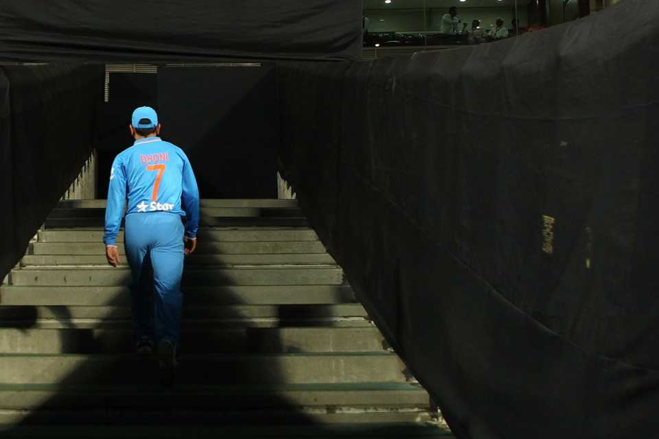 MS Dhoni makes his way to the  change rooms