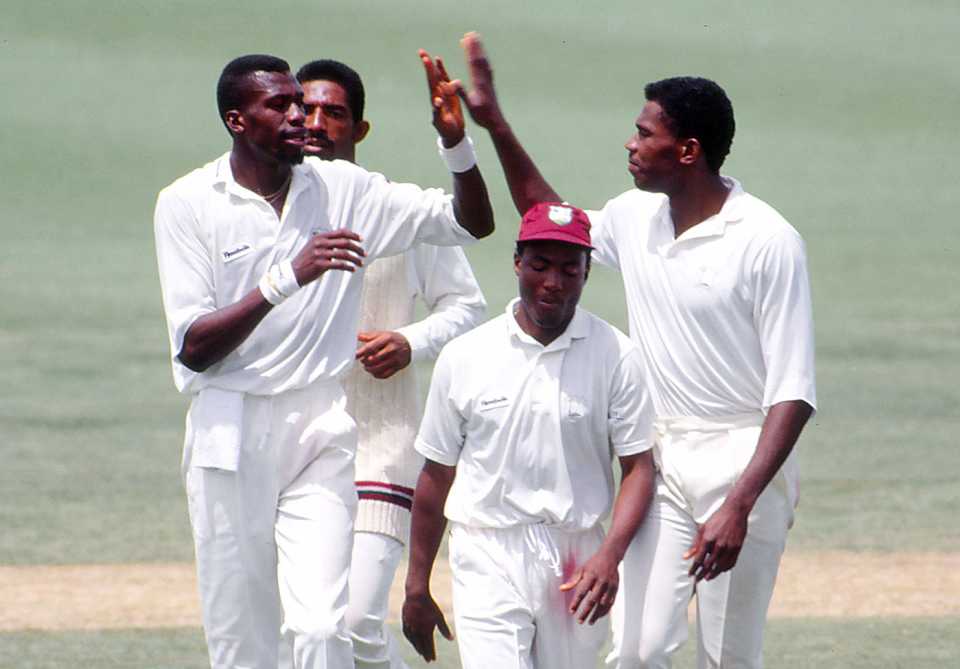 Curtly Ambrose, Phil Simmons, Brian Lara and Ian Bishop celebrate a wicket