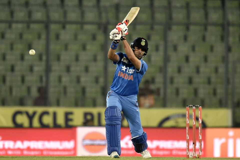 Yuvraj Singh powers one down the ground, India v UAE, Asia Cup 2016, Mirpur, March 3, 2016
