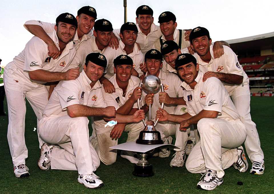 The Australians pose with the series trophy