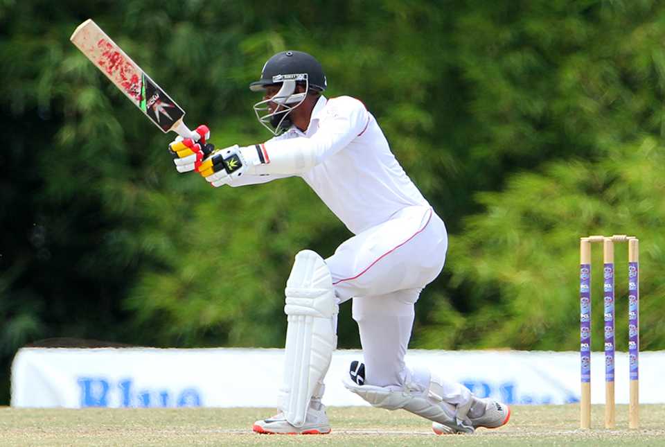 Kyle Hope drives during his 57 in Trinidad & Tobago's second innings, Trinidad & Tobago v Windward Island, Regional 4-day tournament, 3rd day, Couva, March 20, 2016