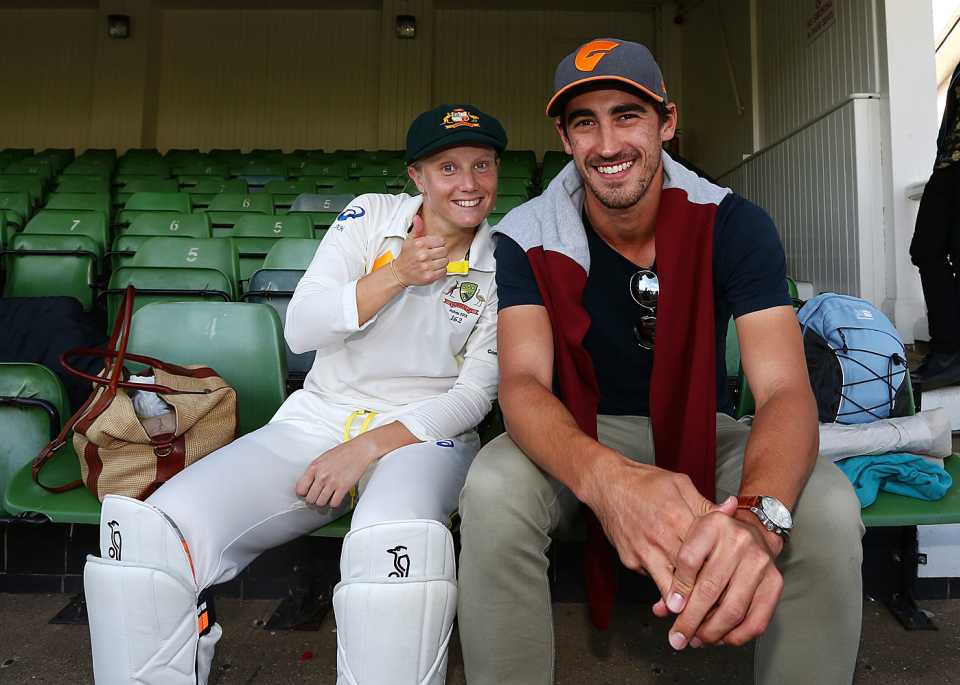 Alyssa Healy celebrates with Mitchell Starc after the win