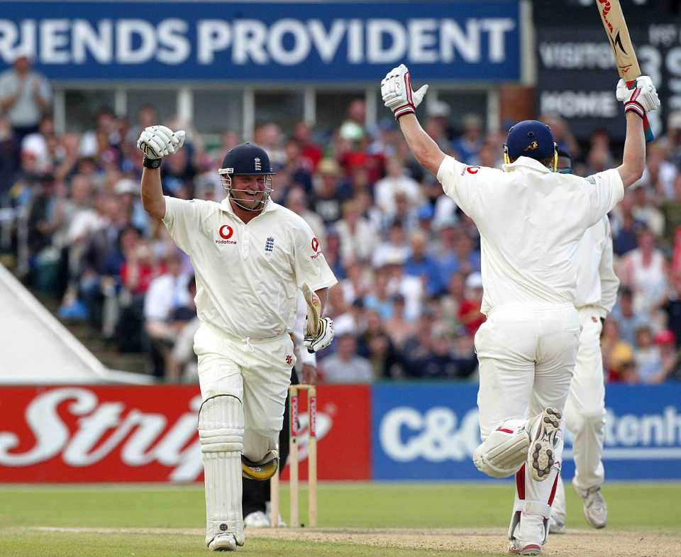 Robert Key and Andrew Flintoff celebrate after chasing down 231, England v West Indies, 3rd Test, Old Trafford, 5th day, August 16, 2004