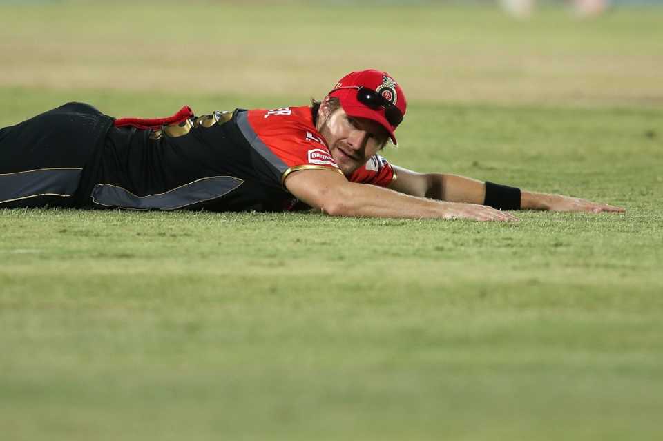 Shane Watson's dive goes in vain as the ball races away to the boundary