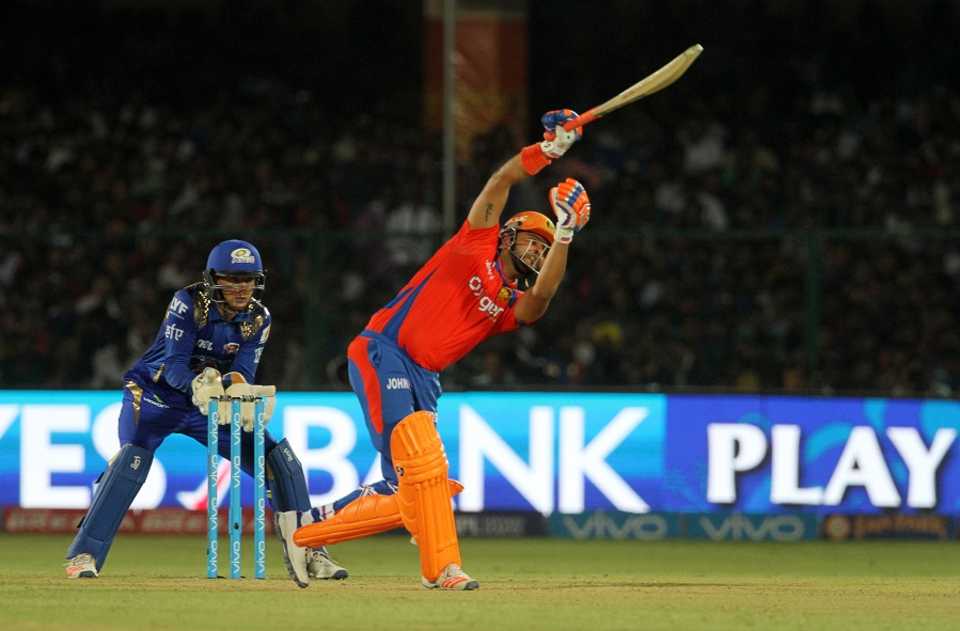 Suresh Raina awkwardly fends one off to the off side