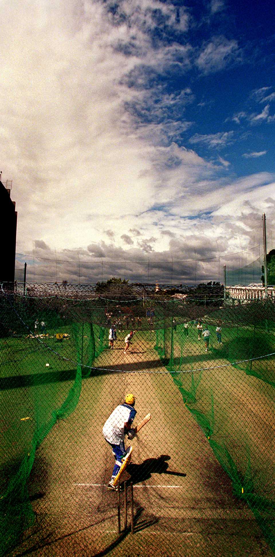 Shane Warne bats in the nets while storm clouds gather in the distance, Melbourne, January 15, 1997