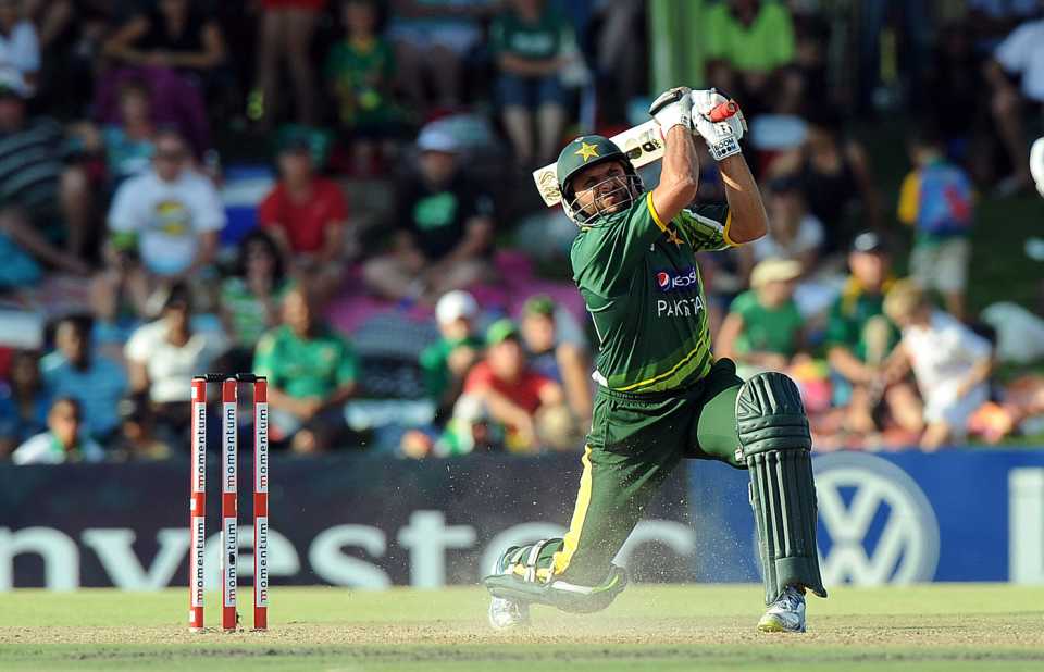 Shahid Afridi tries to clear the ground with a massive hit