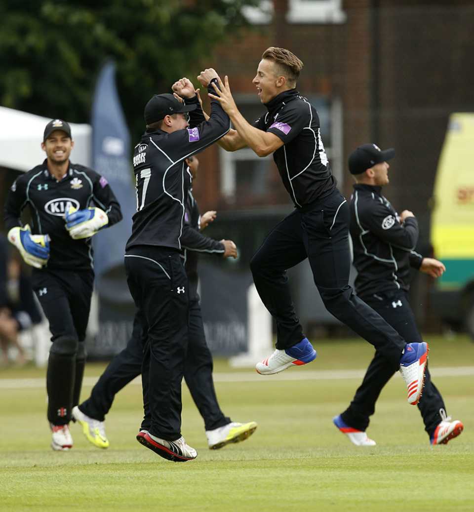 Tom Curran celebrates his first-over wicket of Chris Nash