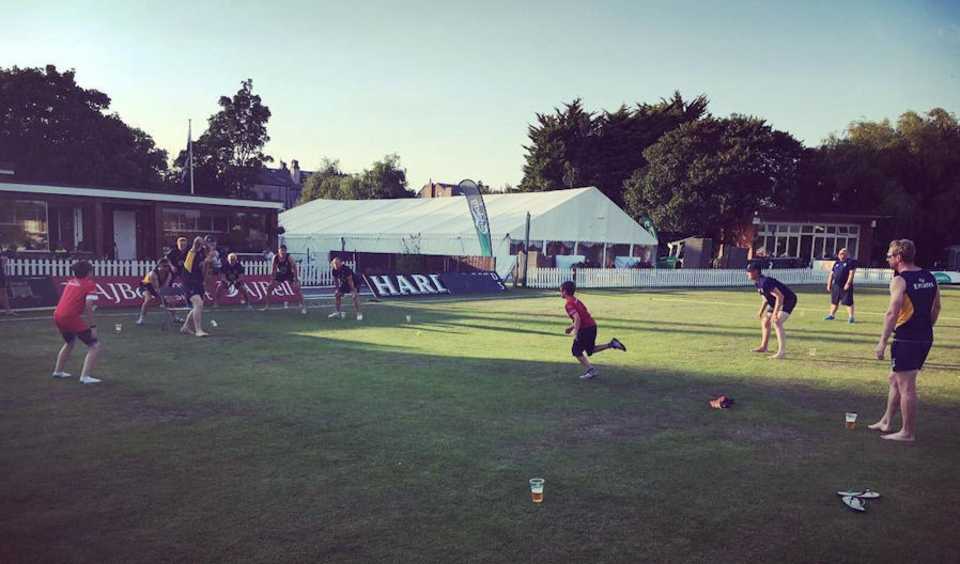 Durham cricketers play with kids on the outfield