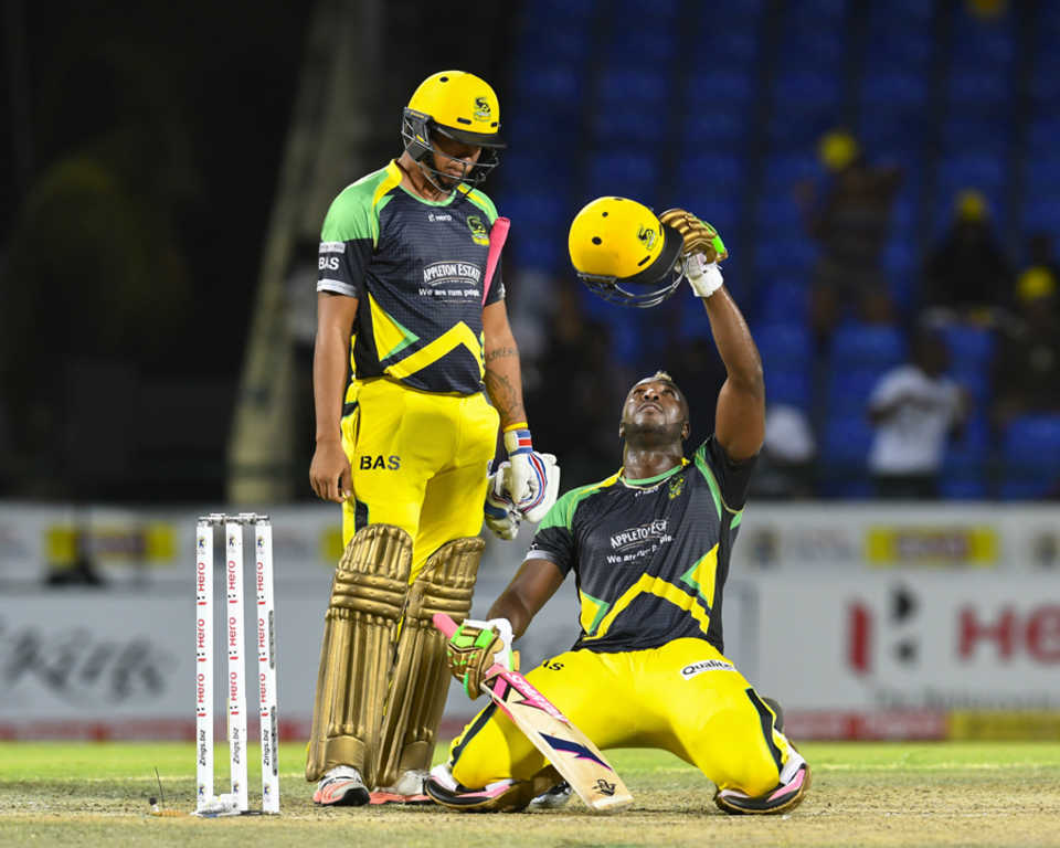 Andre Russell celebrates his whirlwind century