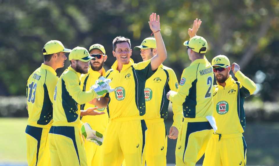 Chris Tremain is congratulated by his team-mates after picking up his fifth wicket, Australia A v India A, quadrangular series, Townsville, August 14, 2016